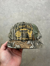 Load image into Gallery viewer, Vintage Realtree Camo “J’s Bow Shop” SnapBack Hat