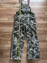 Load image into Gallery viewer, Vintage Carhartt insulated lined overalls bibs vintage duck hunting camo made in USA men’s size 36x30 Union made