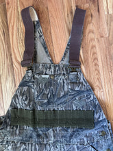 Load image into Gallery viewer, Carhartt Mossy oak tree stand hunting camo vintage overalls men’s size Large/Medium made in USA camo hunting bibs 80s 90s