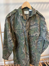 Load image into Gallery viewer, Mossy oak full foliage button up hunting long sleeve camo shirt made in USA 1980s men’s XL green leaf camo