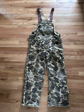 Load image into Gallery viewer, Vintage Carhartt insulated lined overalls bibs vintage duck hunting camo made in USA men’s size 36x30 Union made