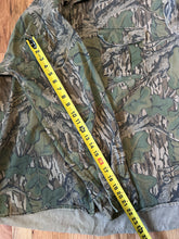 Load image into Gallery viewer, Mossy oak full foliage button up hunting long sleeve camo shirt made in USA 1980s men’s XL green leaf camo