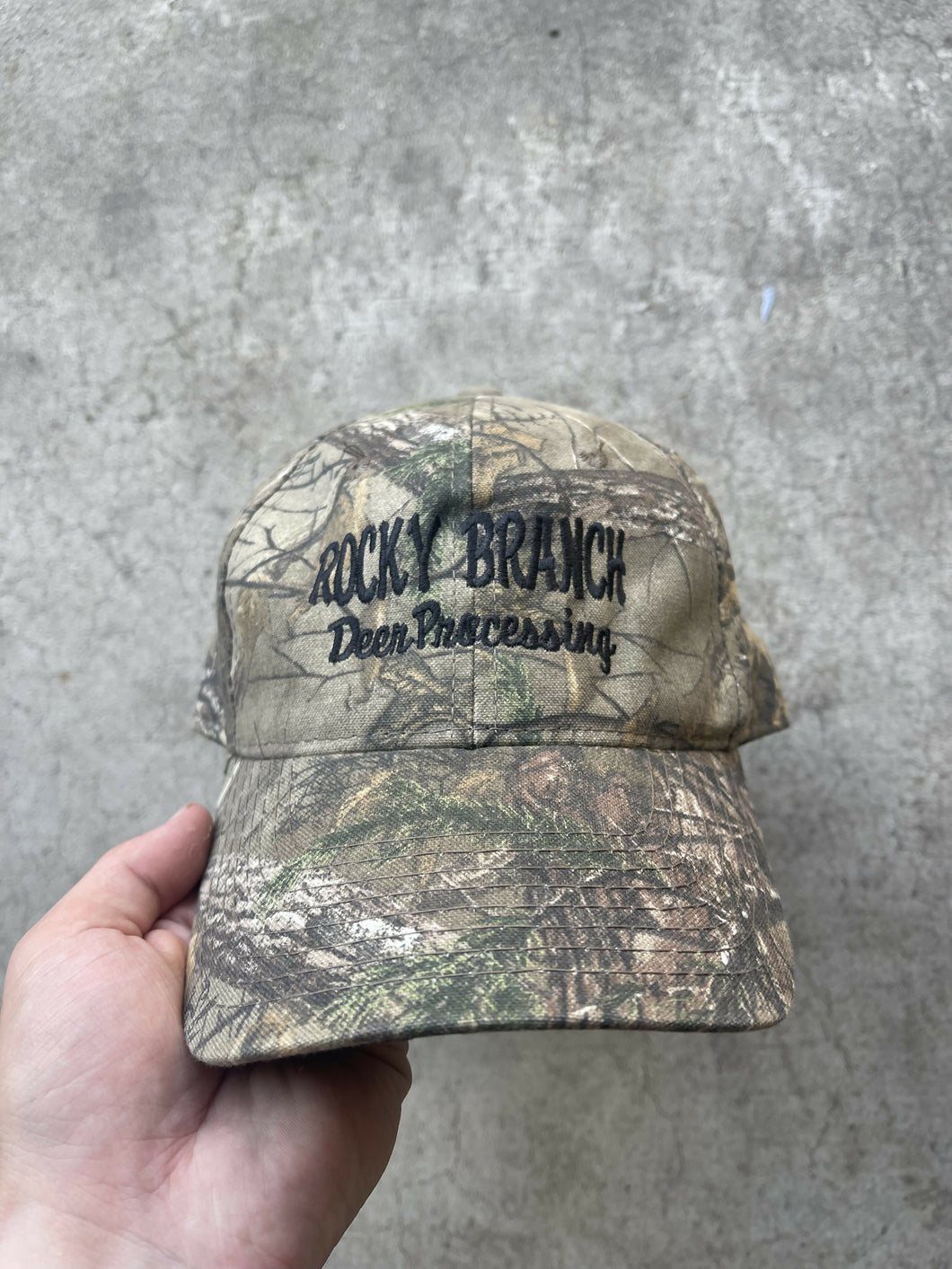 Realtree Camo “Rocky Branch Deer Processing” Hat