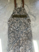 Load image into Gallery viewer, Vintage Distressed Carhartt Mossy Oak Treestand Camo Coveralls (XL)
