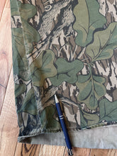 Load image into Gallery viewer, Mossy oak full foliage button up hunting long sleeve camo shirt made in USA 1980s men’s XL green leaf camo