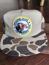 Load image into Gallery viewer, Preserve Game Use a Trained Dog Vintage Camo Hat