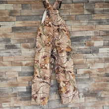 Load image into Gallery viewer, Carhartt RealTree™ quilt Lined bib overalls 34x32