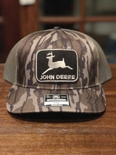 Load image into Gallery viewer, John Deere Patch on a Custom Richardson 112 Mossy Oak Bottomland Trucker Snapback Hat!!